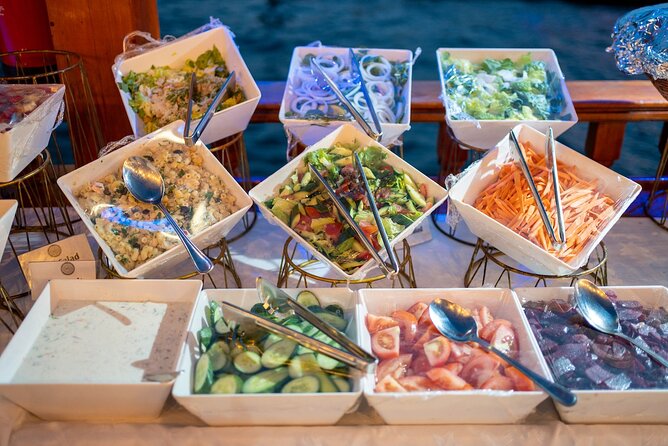 2-Hour Dubai Marina Dhow Dinner Cruise - Open-air seating or the cool lower deck