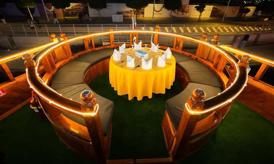 5-Star Marina Dhow Dinner Cruise With Live Entertainment - Boarding a traditional dhow in a modern marina