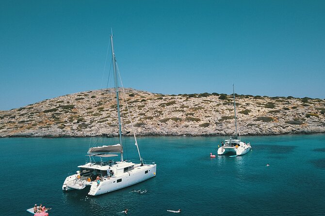 Ag. Nikolaos: Catamaran Trip with Sushi, Drinks, & Water Toys - Spinalonga views without the crowded shoreline