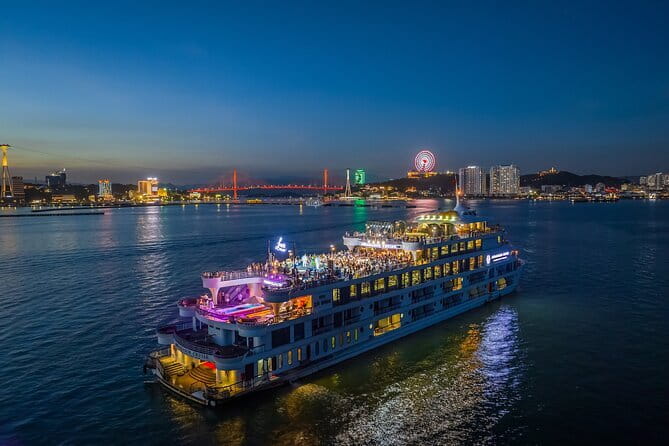 Ambassador Dinner Cruise with Live Music, Firework and Luxe - Halong City lights and Bai Chay Bridge after dark