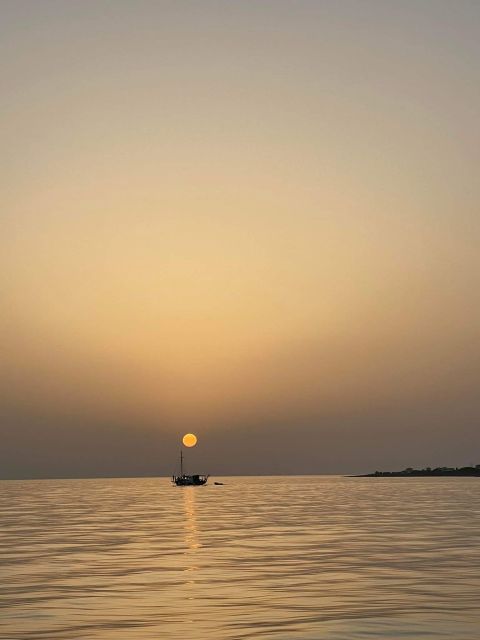 Argostoli: Sunset Cruise with Swim Stops, Dinner, and Wine - Vardiani Islands: a quiet first stop
