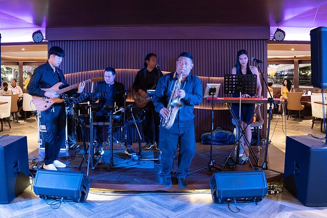 Bangkok Opulence Dinner Cruise Live Band - Temple of Dawn and its shining spire