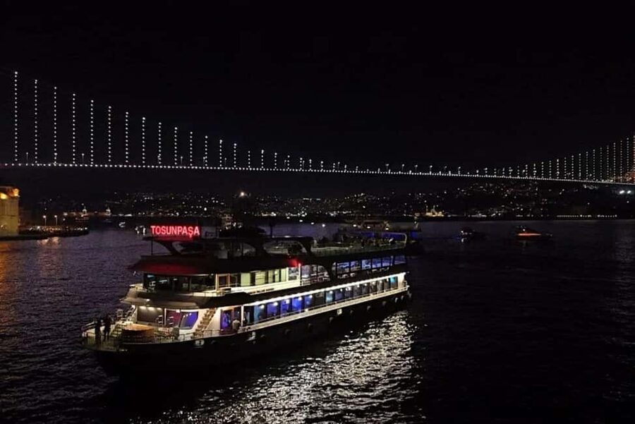 Bosphorus Evening Cruise: Dinner, Shows and Private Table - Leaving Kabataş as Istanbul Lights Up