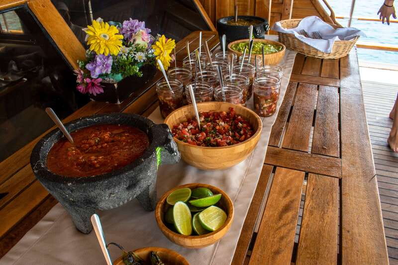 Cabo San Lucas: Sunset Yacht Cruise w/Chef Dinner & Open Bar - The lower-deck dinner with oversized windows