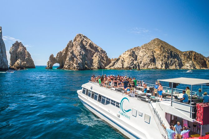 Cabo Sunset Dinner Cruise with Live Music & Open Bar on Cabo Wave - Boarding at CaboMarina near the Breathless Hotel