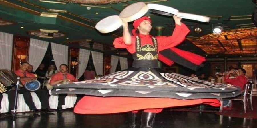 Cairo: Buffet Dinner Cruise with Folkloric Show - The Nile at night is the main setting