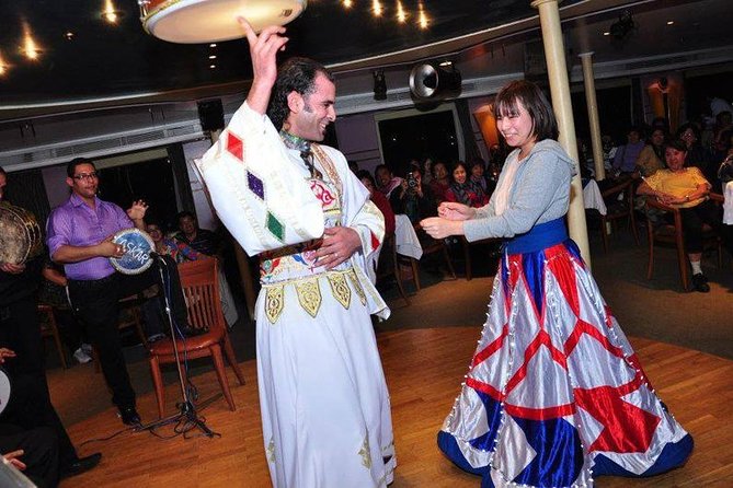 Cairo Dinner Cruise show with belly dancer show on Nile river - The skyline after dark
