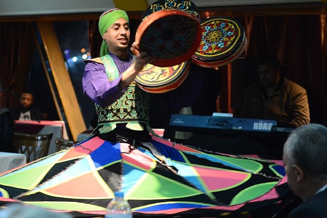 Cairo/Giza: Nile Sunset, Dinner Cruise, Show & Private Transfer - Boarding the boat and finding your place