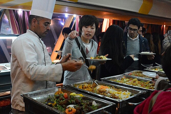 Cairo: Nile Dinner Cruise with Show & Shared Transfer - Folkloric music and belly dancing