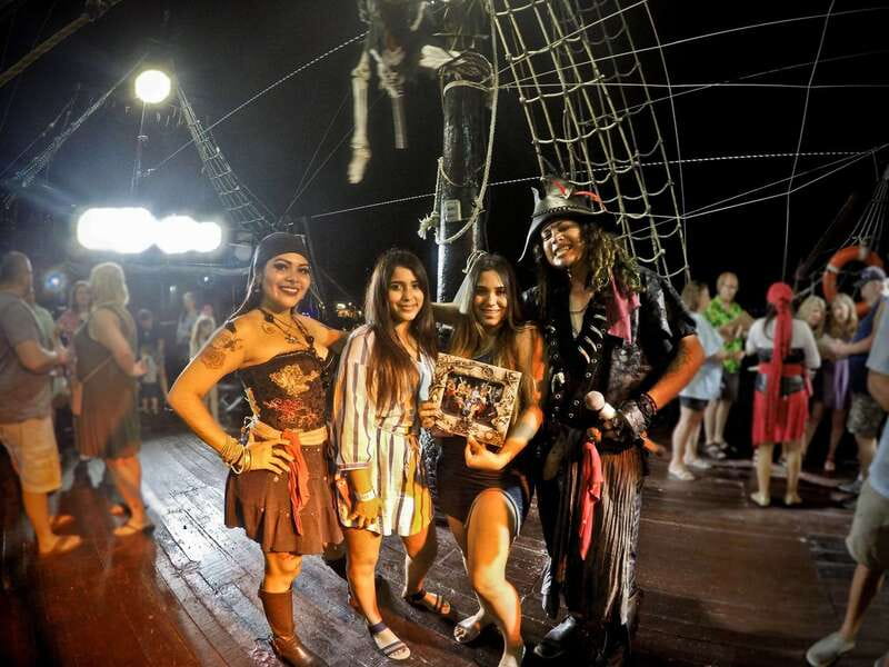 Cozumel: Pirate Ship Cruise with Open Bar, Dinner, and Show - Meeting the pirates at the ferry pier