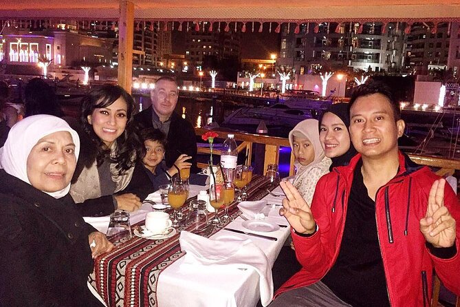 Deira Creek: Dhow Cruise Dinner - Hotel pickup, timing, and group size
