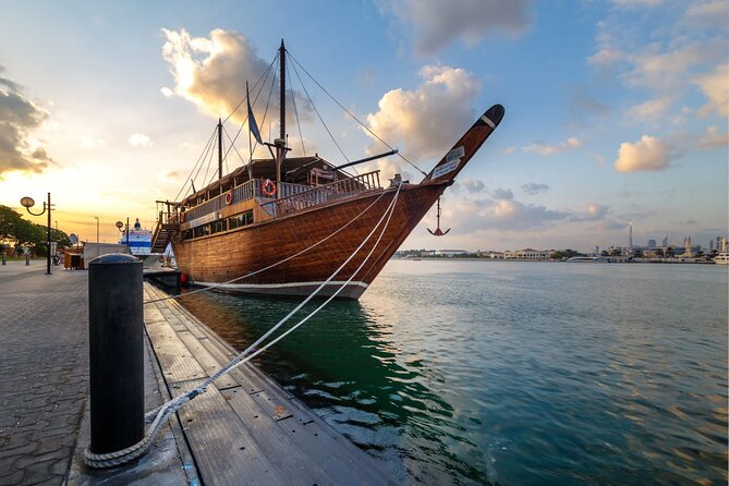 Dhow Cruise Dinner on Dubai Creek - Boarding a traditional dhow on Dubai Creek