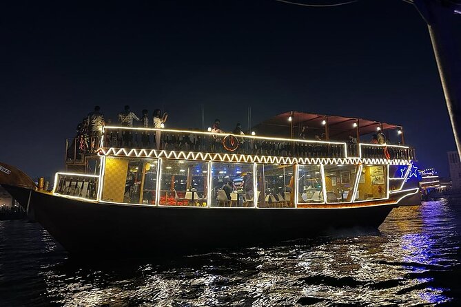 Dhow Cruise with Dinner and Live Entertainment at Dubai Al Seef - Sunset views and nighttime reflections