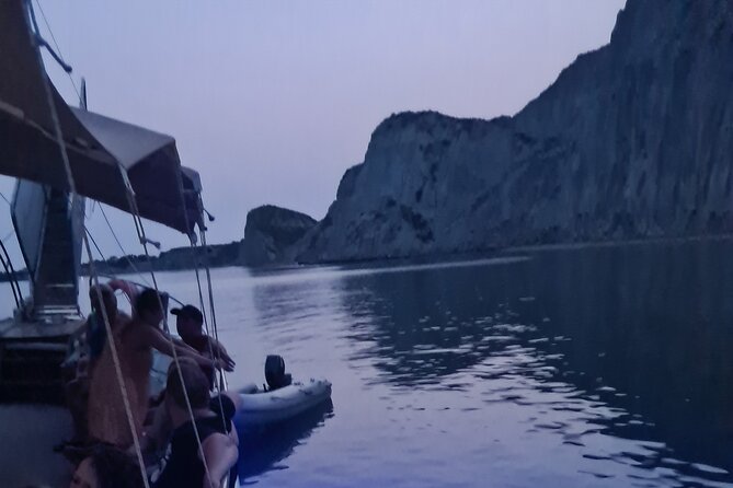 Dreamy Cruise sunset tour with dinner and unlimited wine! - Xi Beach: a 40-minute night swim