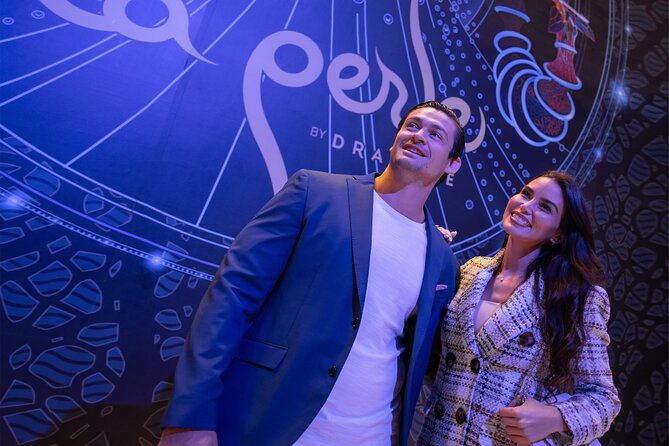 Dubai Canal Dinner Cruise with La Perle Show Tickets Combo - Dubai Design District and Business Bay after dark