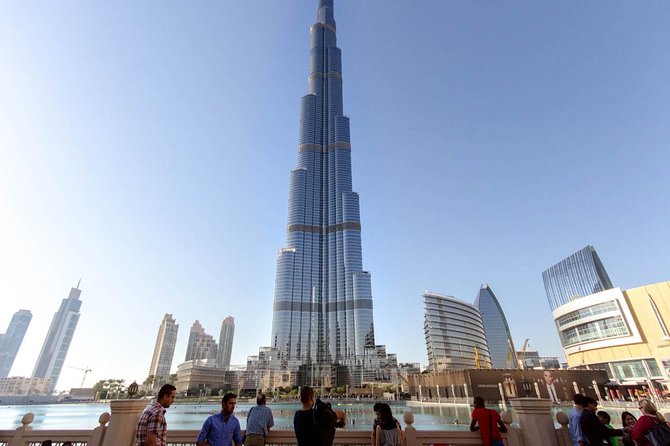 Dubai City Tour and Dhow Dinner Cruise Dinner - Dinner aboard a traditional wooden dhow