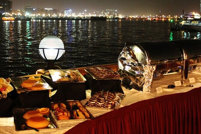 Dubai Creek Dhow Dinner Cruise - Boarding a traditional dhow on Dubai Creek