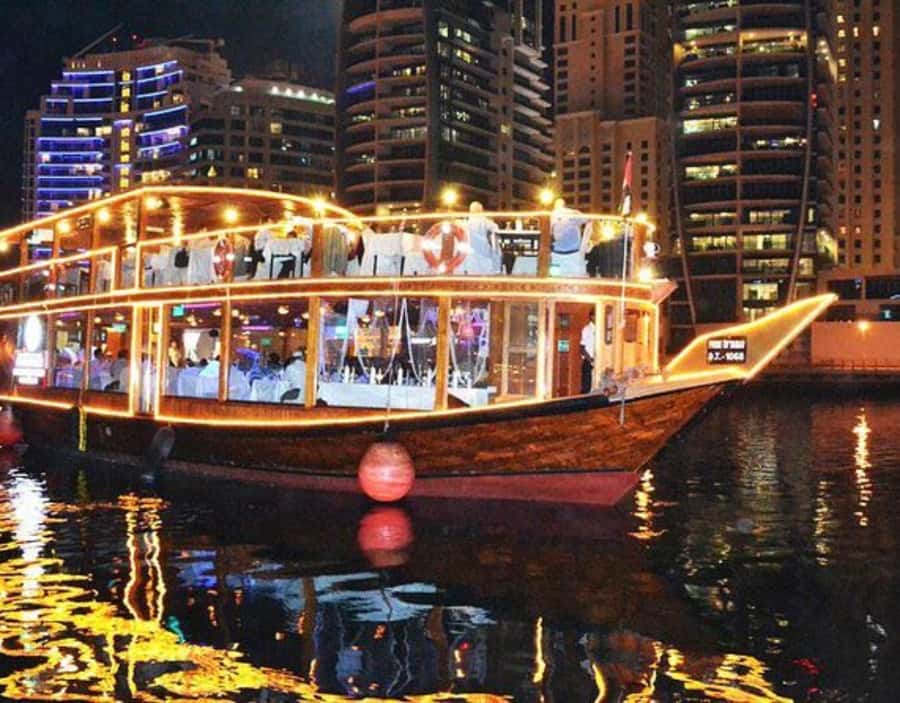 Dubai: Dhow Dinner Cruise on Creek or Marina with Live Shows - Sunset views and the changing city after dark