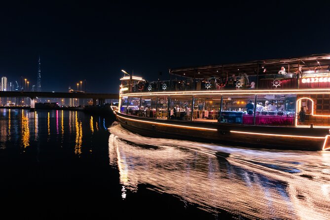 Dubai Luxury Canal Dinner Cruise with Optional Transfer - Dubai Design District and Business Bay at night