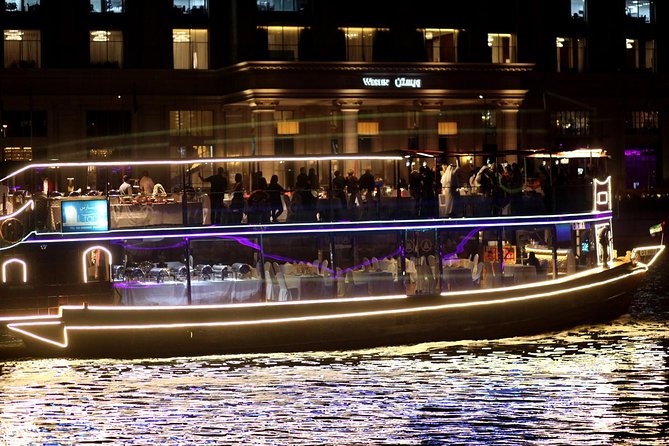 Dubai Luxury Canal Dinner Cruise with Optional Transfer - Buffet dinner, drinks, and live saxophone