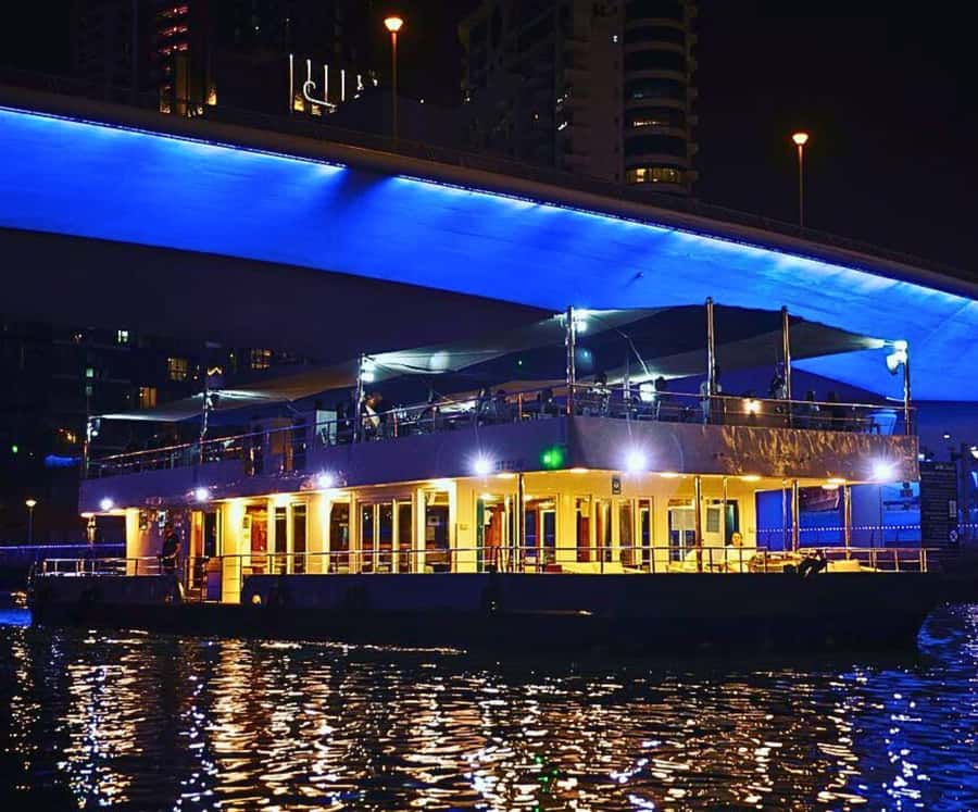 Dubai: Marina Premium Dinner Cruise with Unlimited Drinks - DJ, live show, and the changing mood onboard