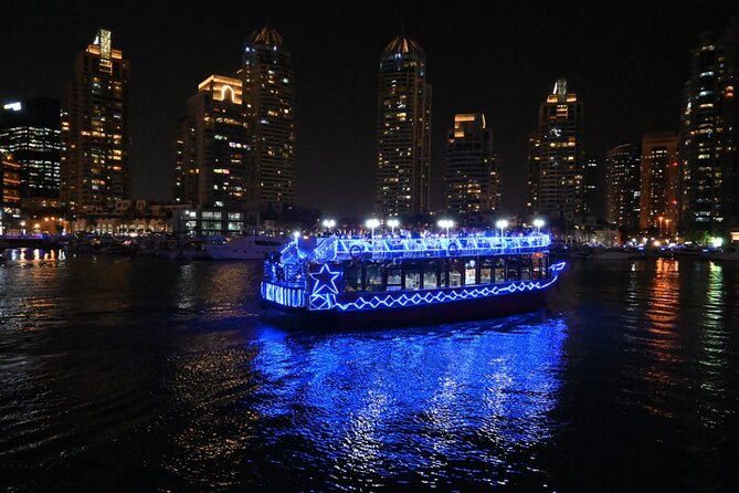 Dubai Marina Unique Dhow Cruise Buffet Dinner and Belly Dance - Cayan Tower and the modern Dubai skyline