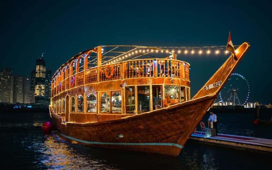 Dubai: Scenic Dhow Cruise with Buffet Dinner and Live Shows - Boarding a Traditional Dhow