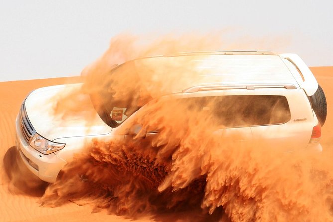 Dubai Trio: Desert Safari, ,Dubai City Tour & Dhow Cruise Dinner - Day one: red dunes, engines, and sunset sand