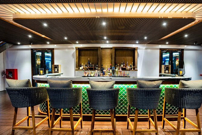 Halong Bay Luxury Dinner Cruise - Ambassador - Seeing Ha Long City and Bai Chay Bridge at night