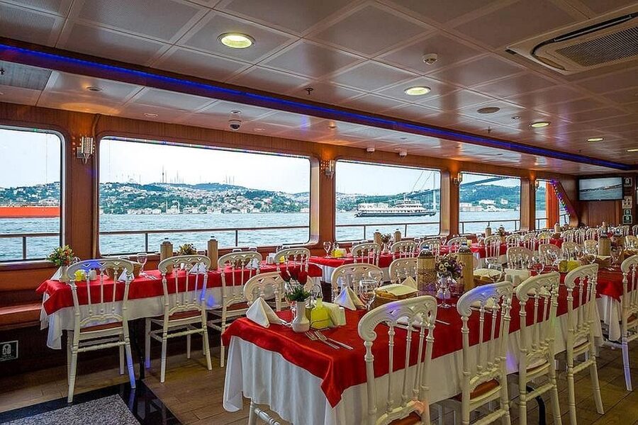 Istanbul Bosphorus Dinner Cruise &Entertainment hotel pickup - Dolmabahce Palace and Ciragan Palace from the water