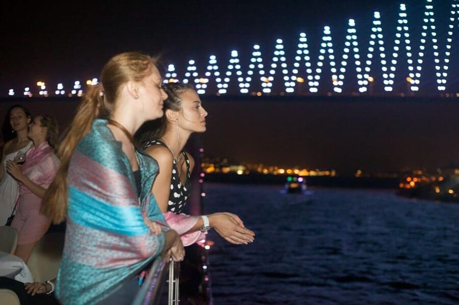 Istanbul: Bosphorus Night Dinner Cruise with Private Table - Çırağan Palace and the first bridge views