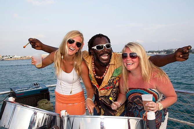 Key West Sunset Cruise: Dinner, Live Music & Drinks Included - Watching the sun drop from the upper deck