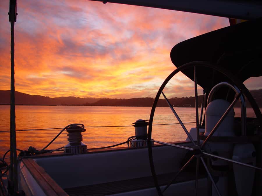Knysna Sunset Sailing Cruise with Light Dinner and Wine - Passing the Knysna Heads, if conditions allow