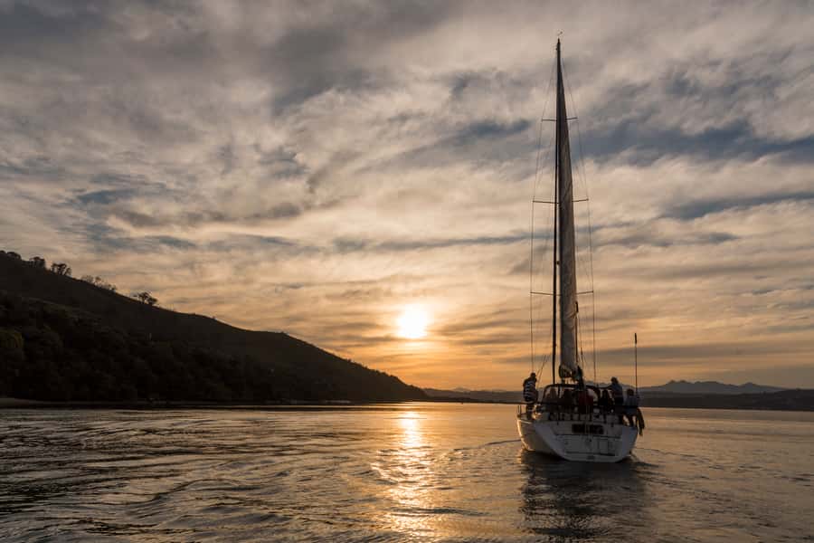 Knysna Sunset Sailing Cruise with Light Dinner and Wine - Sailing the lagoon aboard Outeniqua