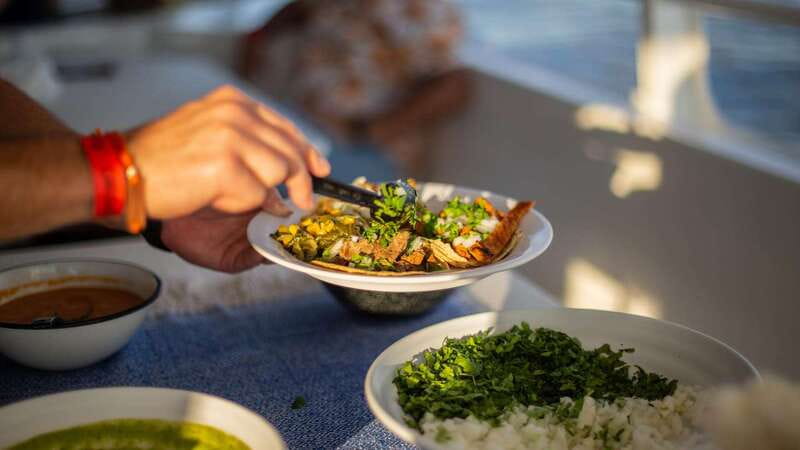 Los Cabos: Sunset Dinner Cruise with Transportation - Mexican tacos, drinks, and the open bar