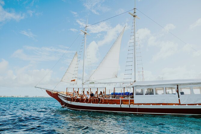 Luxury Four-Course Caribbean Dinner Cruise Experience - Boarding at Pelican Pier in Noord
