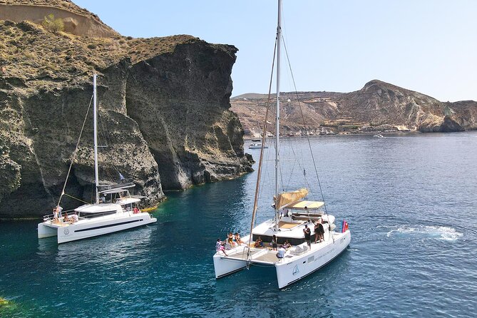 Luxury Santorini Sunset Cruise: Dinner, BBQ, Open Bar, Transfers - Thirasia, swimming, and the onboard meal