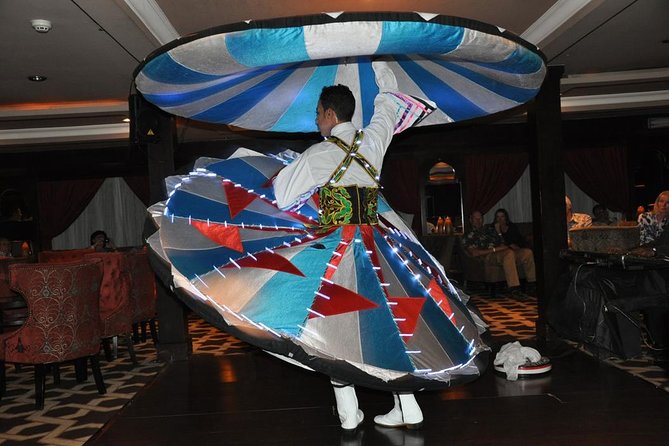 Nile Cruise Dinner Entertainment and Belly Dance Show - Boarding the Nile boat and settling in for dinner