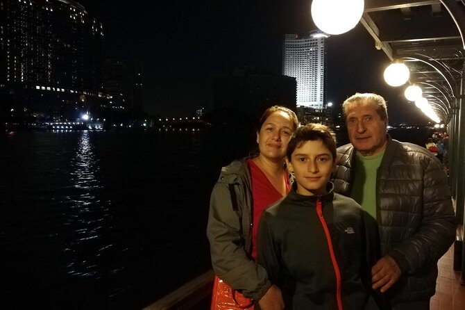 Nile Dinner Cruise in Cairo With Belly Dancing and Transfer - Boarding the boat and settling in