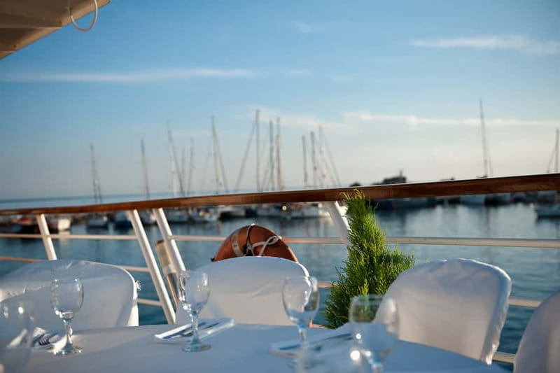 Paphos: Wave Dancer Fireworks, Buffet Dinner & Show Cruise - Dropping anchor near Riccos Bay