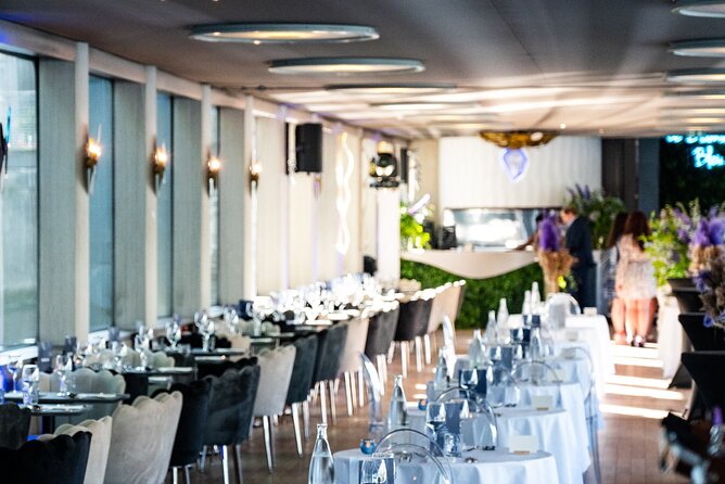 Paris Gourmet Dinner Seine River Cruise with Singer and DJ Set - Île Saint-Louis and Notre-Dame from the water