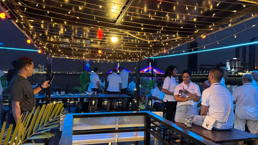 Phnom Penh: Sunset Dinner Cruise with English Speaking Guide - Stilted houses, fishing villages, and shore crops