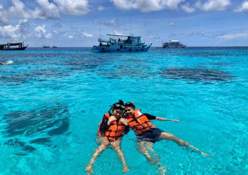 Phuket: Coral Island Catamaran Cruise with Sunset Dinner - Coral Island beach time at Koh Hey