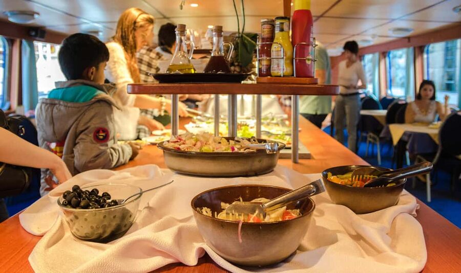 Prague: Dinner Cruise with Hotel Pickup and Drop-off - Boarding the air-conditioned boat