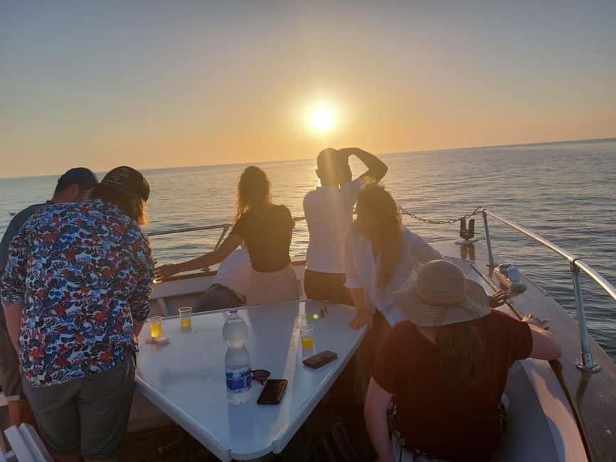 Pula: Brijuni Dolphins Sunset Cruise with Dinner and Drinks - A warm Istrian meal on board