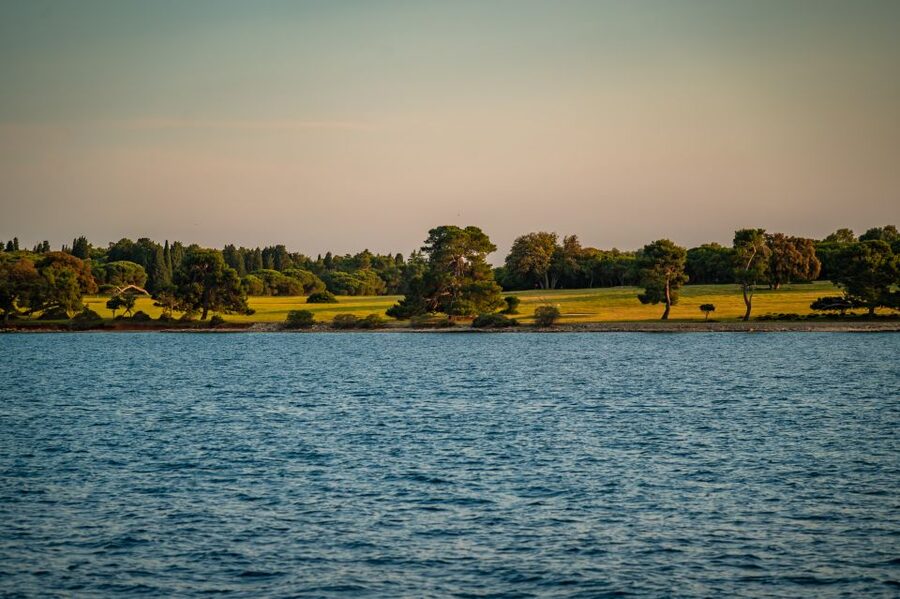 Pula: Brijuni National Park Sunset, Dolphins & Dinner Cruise - Pula harbor and the Austro-Hungarian port