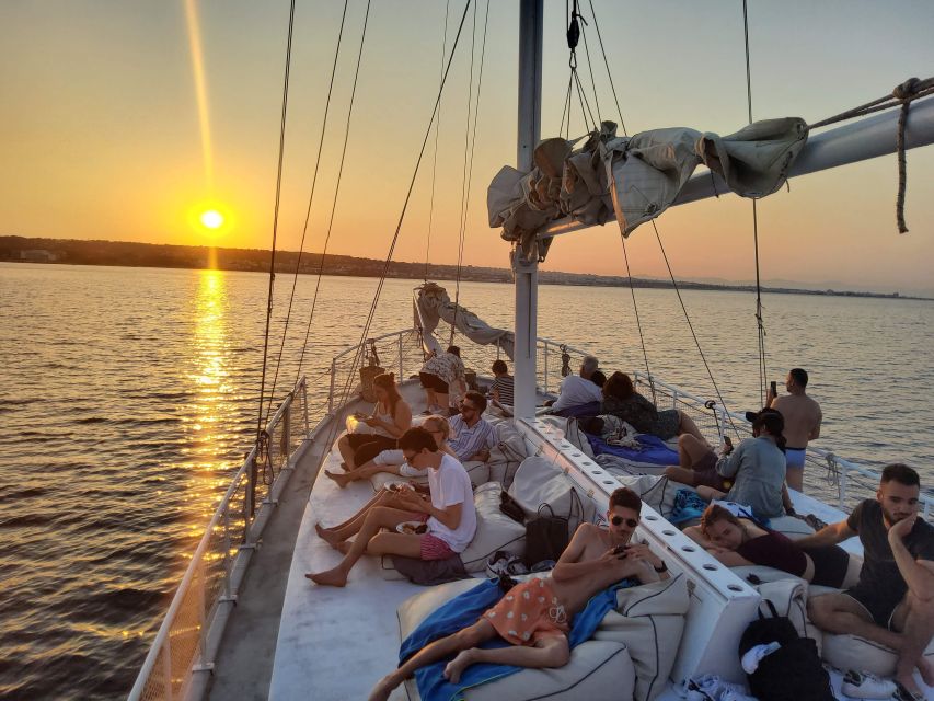 Rhodes: Sunset Cruise with Open Bar, Dinner, & Live Music - Greek dinner with seafood and special-diet choices