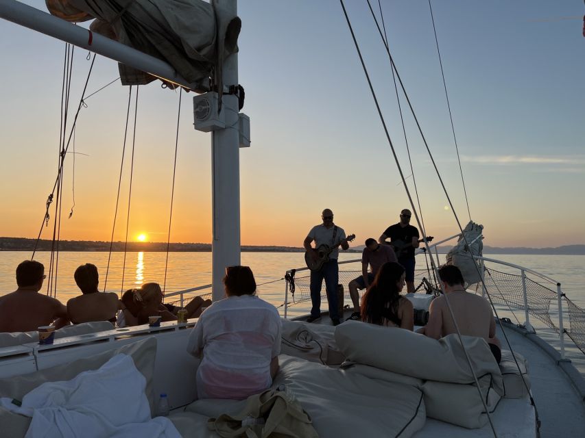 Rhodes: Sunset Cruise with Open Bar, Dinner, & Live Music - The practical value of $93 per person