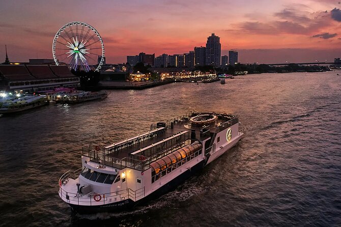 Saffron Luxury Dinner Cruise: A Journey on the River of Kings - The Grand Palace and Wat Arun after sunset