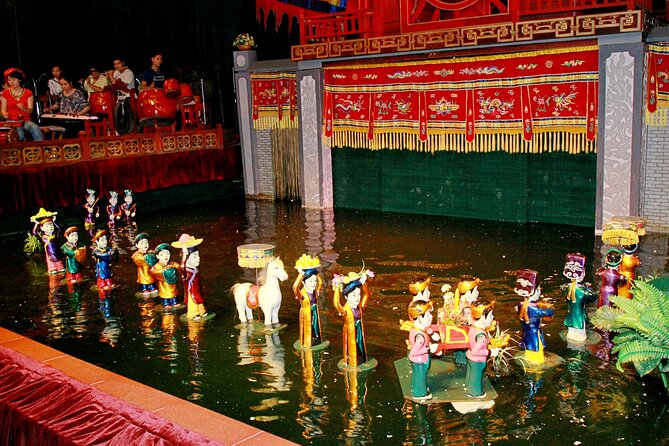 Saigon Evening: Water Puppet Show & Dinner Cruise Experience - Dinner on a classic junk boat